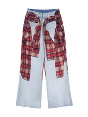 Plaid patchwork wide-leg men's jeans in light wash denim with red plaid accents and drawstring waist.