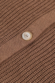 Taupe knit cardigan with a single button closure and diamond-cut detail.
