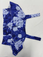 Ruffled floral two-piece set in French blue polyester with tie straps.