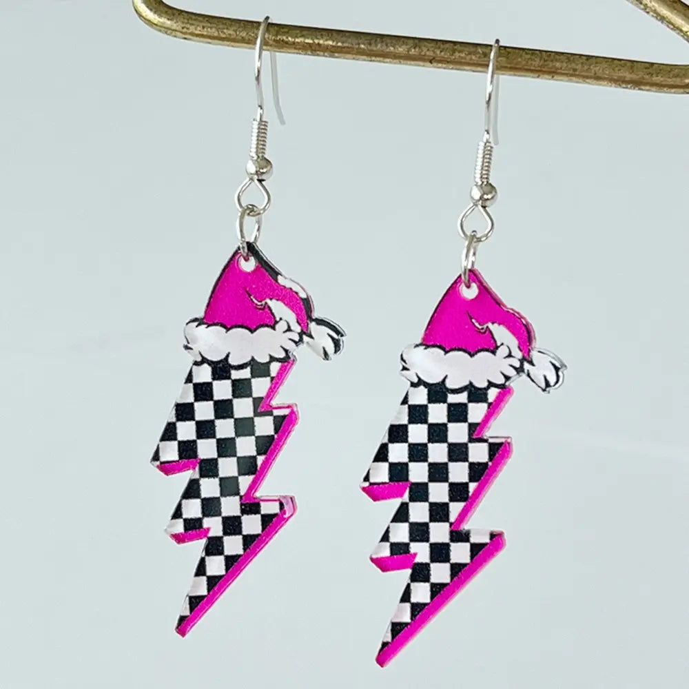 Festive acrylic lightning bolt earrings with pink Santa hats and checkerboard pattern