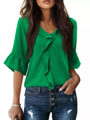 Green maternity shirt with V-neck and cascading ruffles, 3/4 bell sleeves.