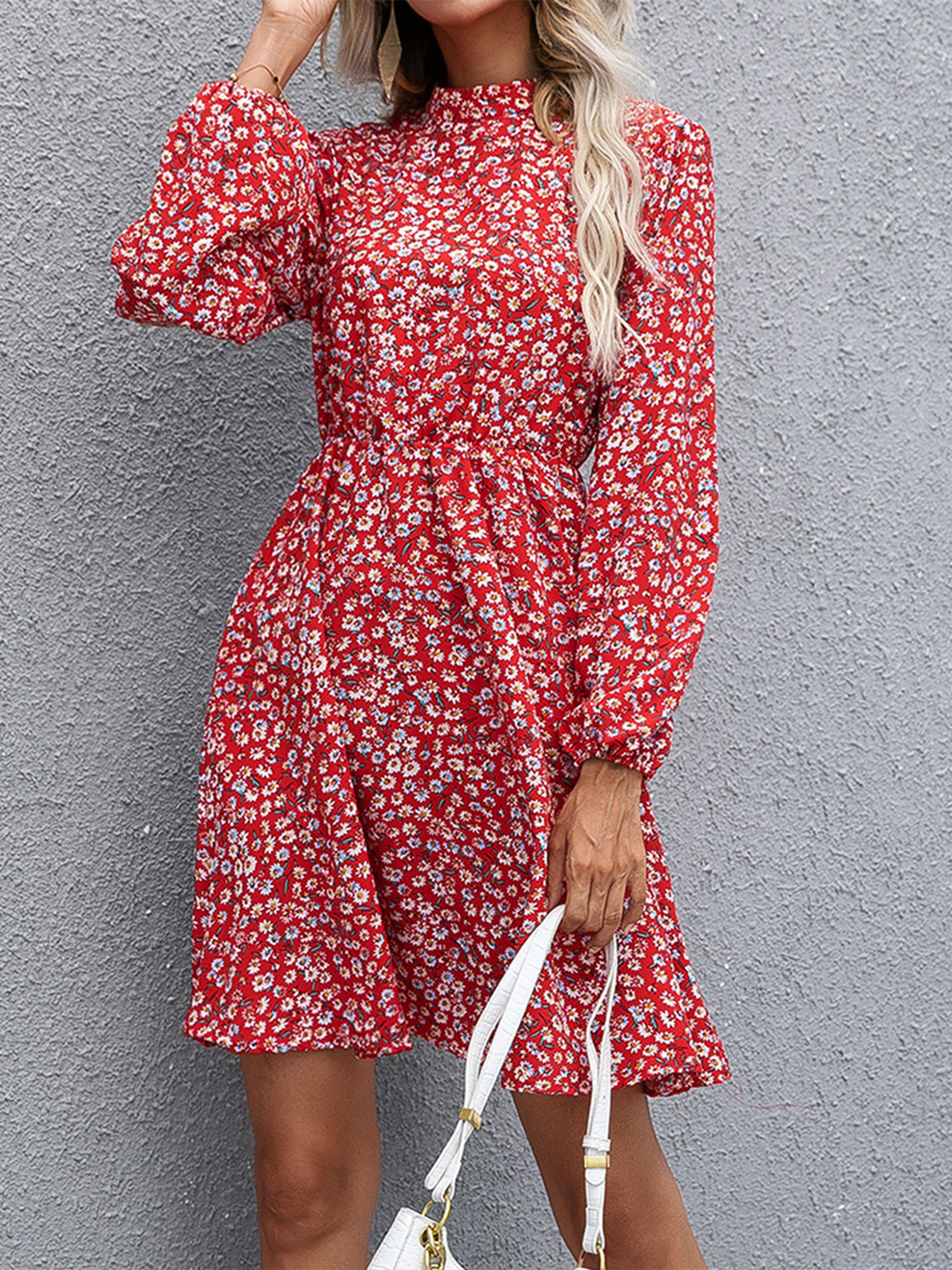 Crimson floral mini dress with gathered sleeves and mock neck.