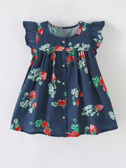 Navy cotton dress with strawberry print, ruffle sleeves, and button front.