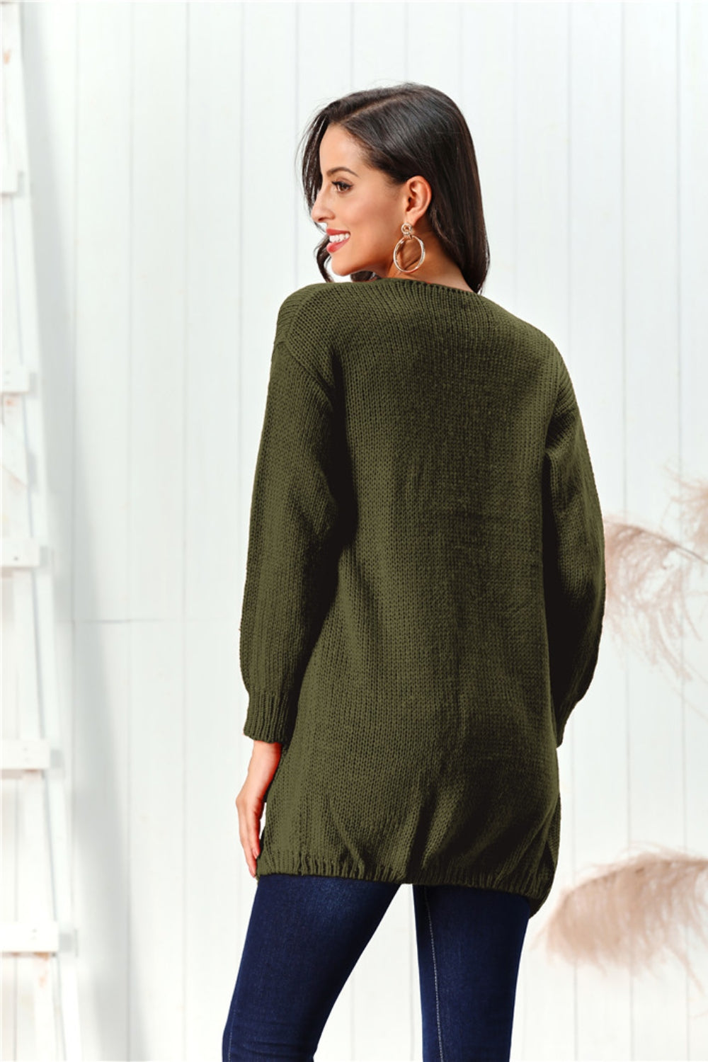 Army green acrylic knit cardigan with long sleeves and a draped open-front cut.