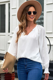 White ruched cuff voluminous sleeve blouse with V-neck