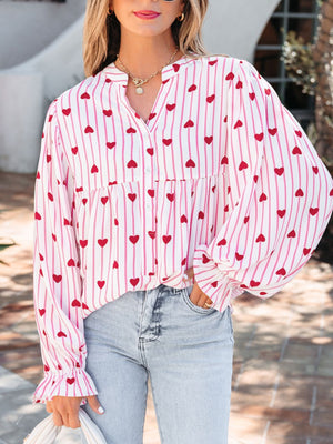 Maternity blouse with pink stripes and red hearts, button front, flounce sleeves.
