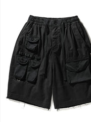 Black cargo shorts with multiple utility pockets and drawstring waist.