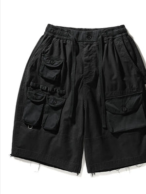 Black cargo shorts with multiple utility pockets and drawstring waist.