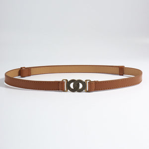 Brown vegan leather belt with interlocking bronze buckle detail