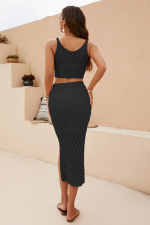Black textured knit crop top and midi skirt set with diamond pattern and side slit