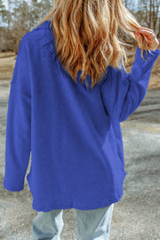 Royal Blue textured shacket with raw-edge detailing, long sleeves, and a relaxed fit.