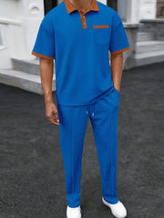 Blue textured polo shirt with contrast trim and track pants set.