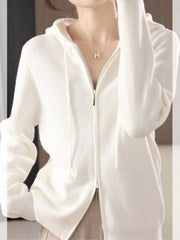 White ribbed knit zip-through hoodie with drawstring hood and silver zipper detail.