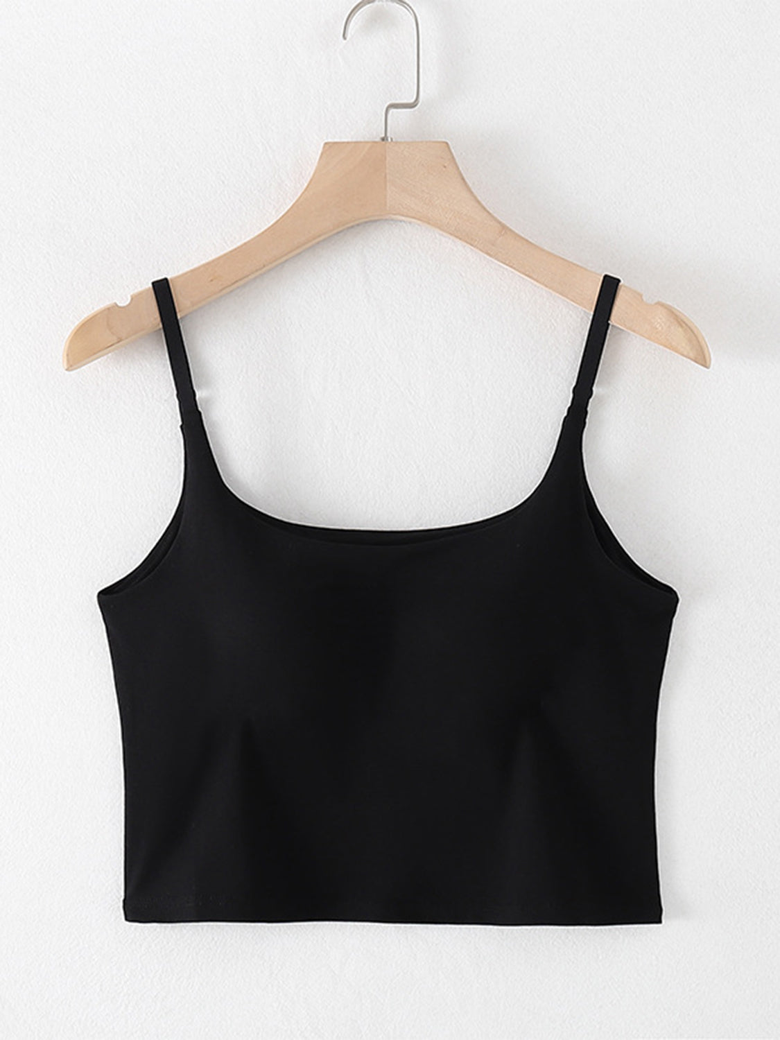 Black built-in bustier crop camisole with adjustable spaghetti straps and a square neckline.