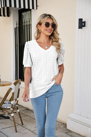 White perforated puff sleeve v-neck blouse with eyelet details