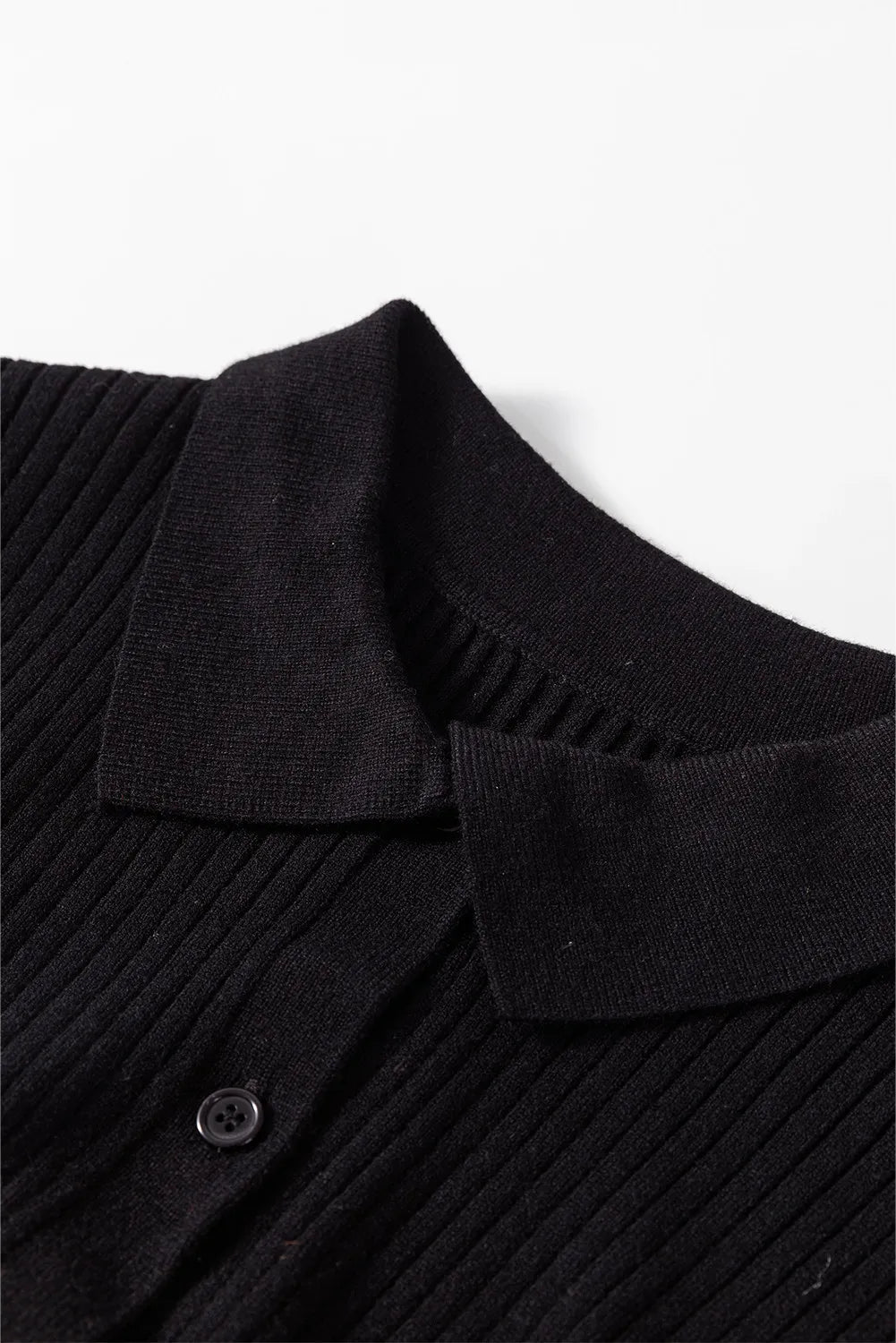 Black ribbed knit polo cardigan with button detail