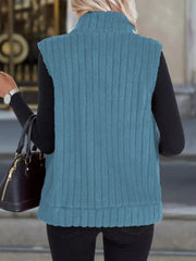 Sky blue fleece zip-up vest with ribbed texture and stand collar.