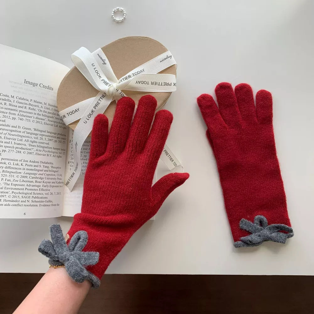 Deep Red knit gloves with grey bow detail on cuff, cozy adult accessories.
