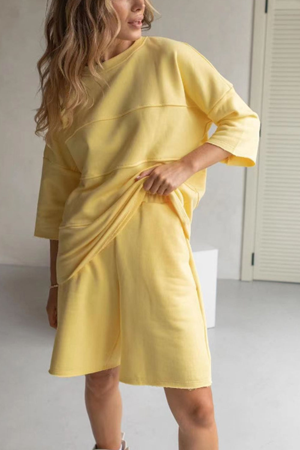 Relaxed fit yellow sweatshirt and shorts set with seam details