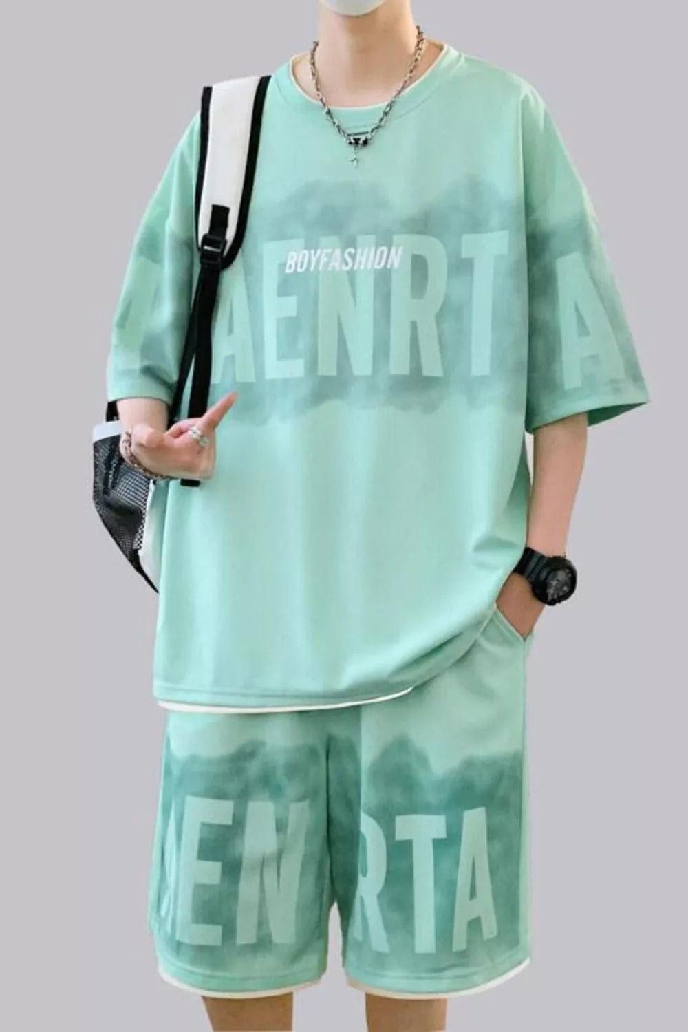 Light Green oversized lettered tee and shorts set with tie-dye effect and white trim.