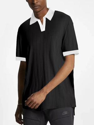 Men's black ribbed short sleeve polo with white contrast collar and cuffs