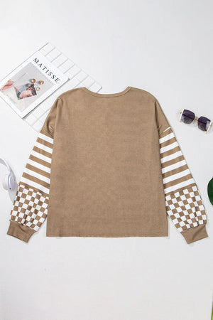 Camel knit top with asymmetrical checkered and striped sleeves