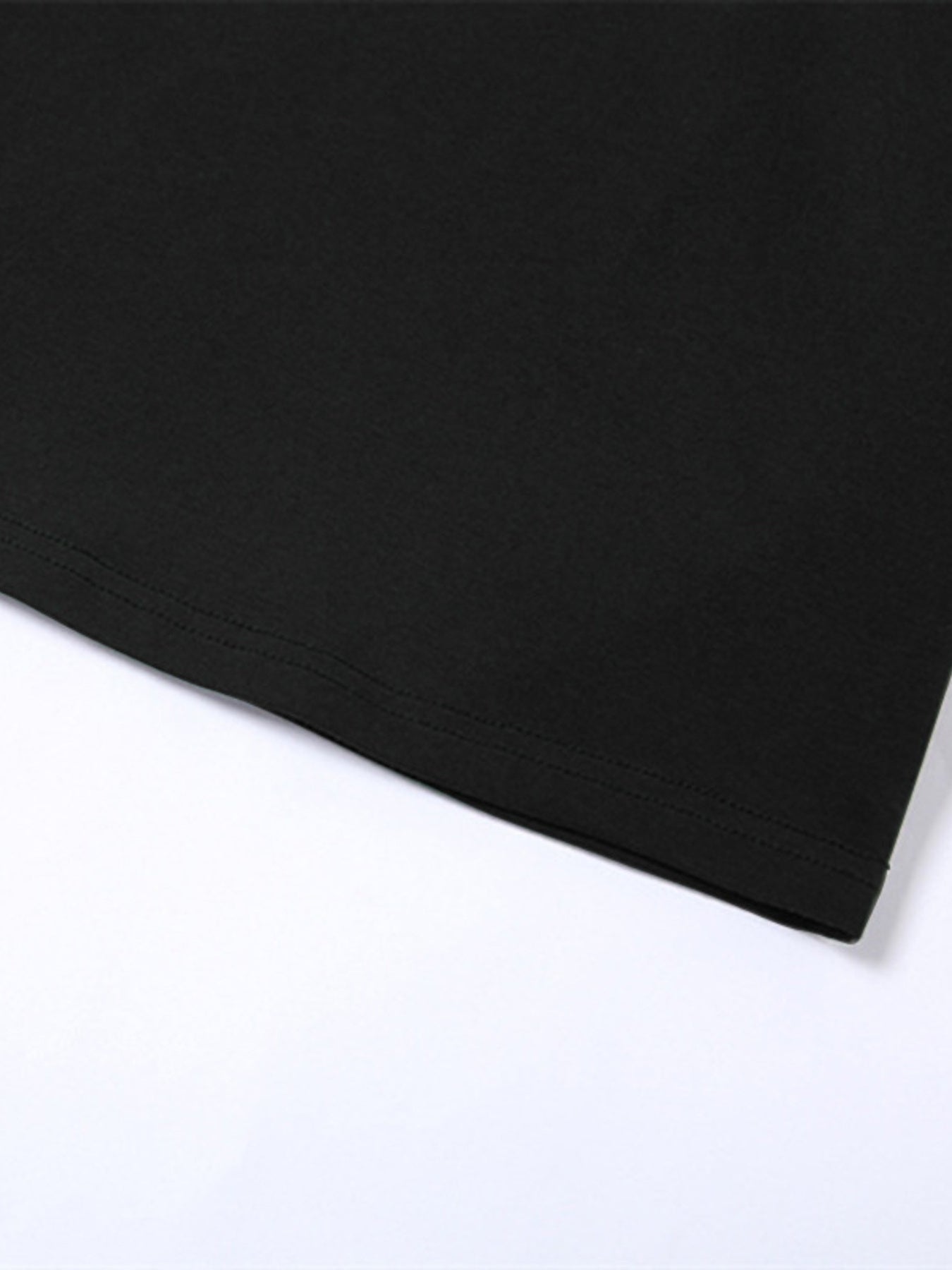 Black cropped t-shirt with crew neck and double-stitched hem detail.