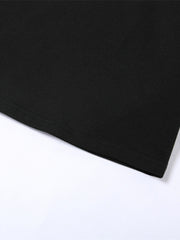 Black cropped t-shirt with crew neck and double-stitched hem detail.
