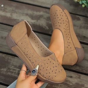 Coffee floral cutout slip-on loafers with breathable design.