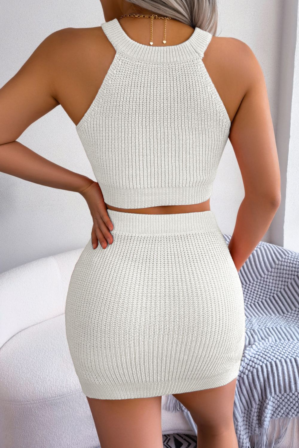 White knit halter crop top and mini skirt set with ribbed texture.