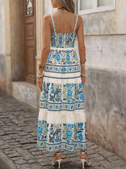 Blue floral maxi dress with smocked bodice and tiered skirt