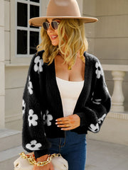 Black acrylic floral puff sleeve open cardigan with white blooms