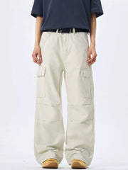 Off-white 100 cotton wide-leg cargo pants with multiple pockets and belt loops.