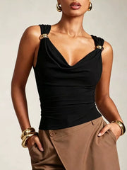 Black cowl neck tank top with gold ring details on straps.