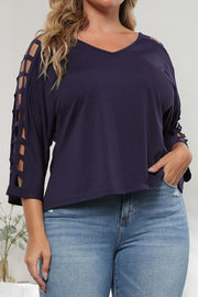 Dark navy v-neck blouse with lattice cutout sleeves.