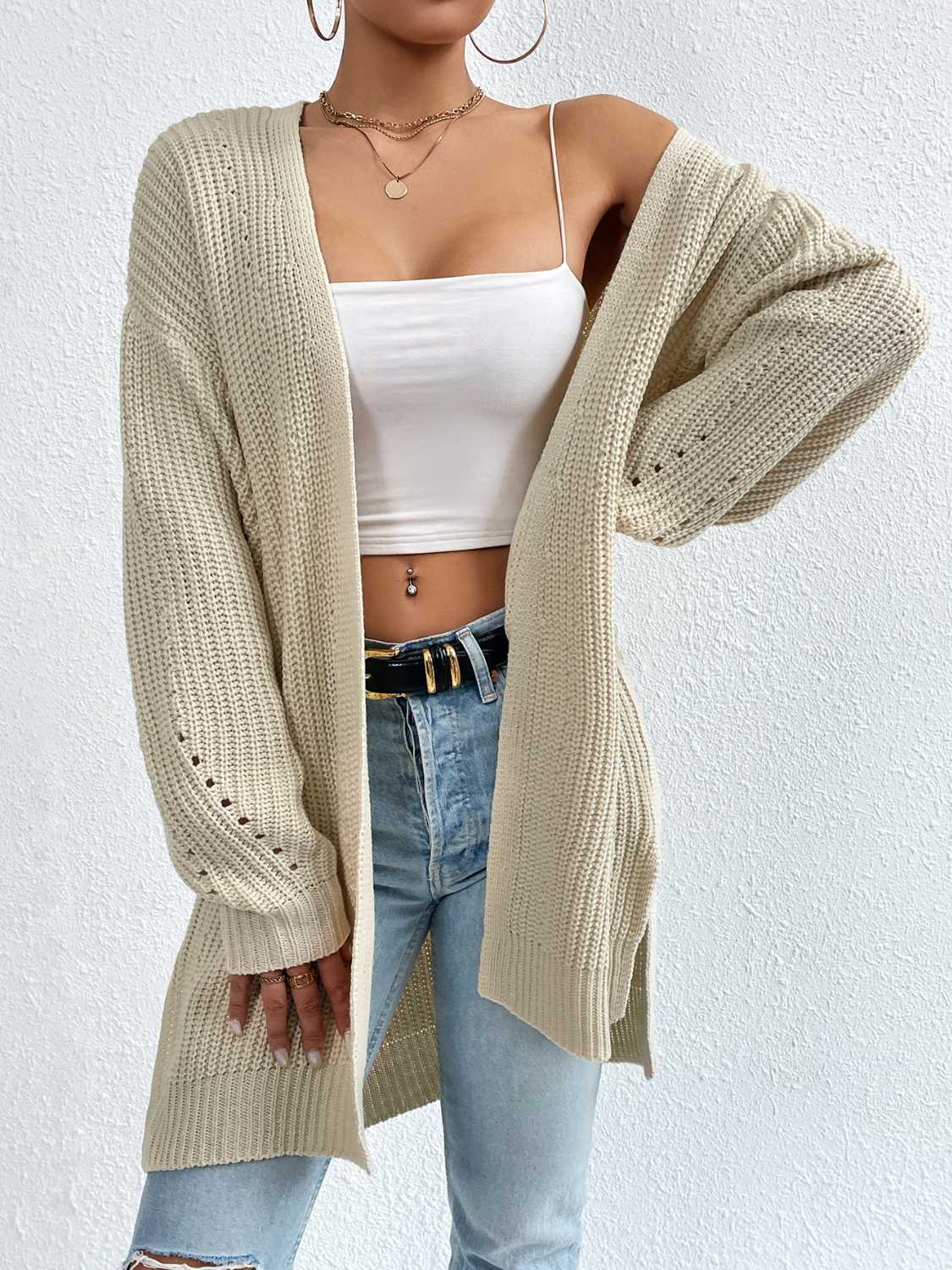 Longline knit open cardigan in beige with subtle eyelet details on sleeves.