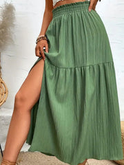 Textured tiered maxi skirt in matcha green with a high slit and smocked waist.