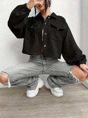 Black corduroy blouson jacket with balloon sleeves and button front, cropped length.