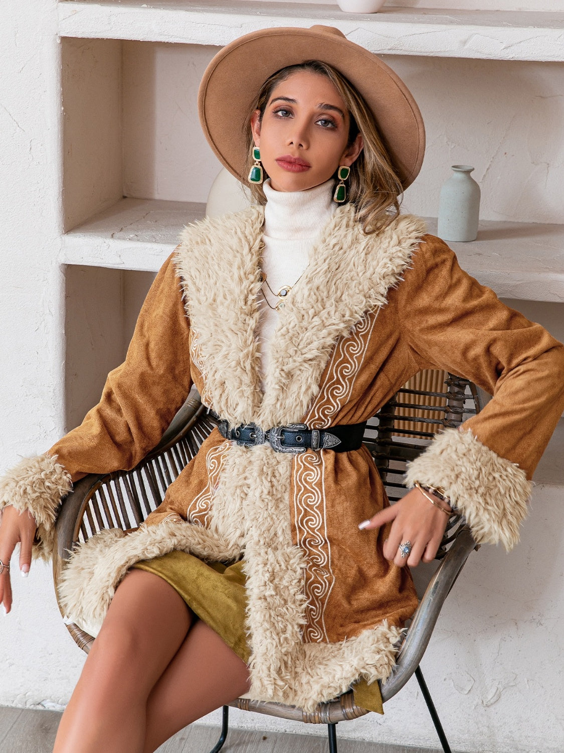 Bohemian caramel suede coat with shearling trim and embroidered details.
