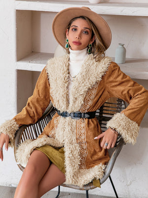 Bohemian caramel suede coat with shearling trim and embroidered details.