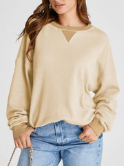 Tan waffle knit raglan sleeve sweatshirt with contrast V-neck detail and crew neck.