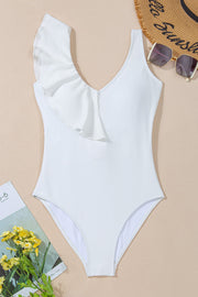 White textured one-piece swimsuit with a ruffled asymmetrical neckline and V-neck.