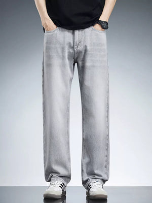Men's light grey relaxed fit wide leg cotton jeans with a casual contemporary style.