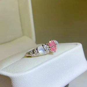 Silver ring with pink oval moissanite and mother-of-pearl band