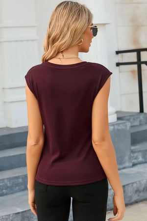 Dark brown ribbed cotton cutout top with cap sleeves and a crew neck.