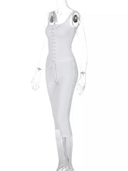 White ribbed lace-up tank top and capri pants ensemble