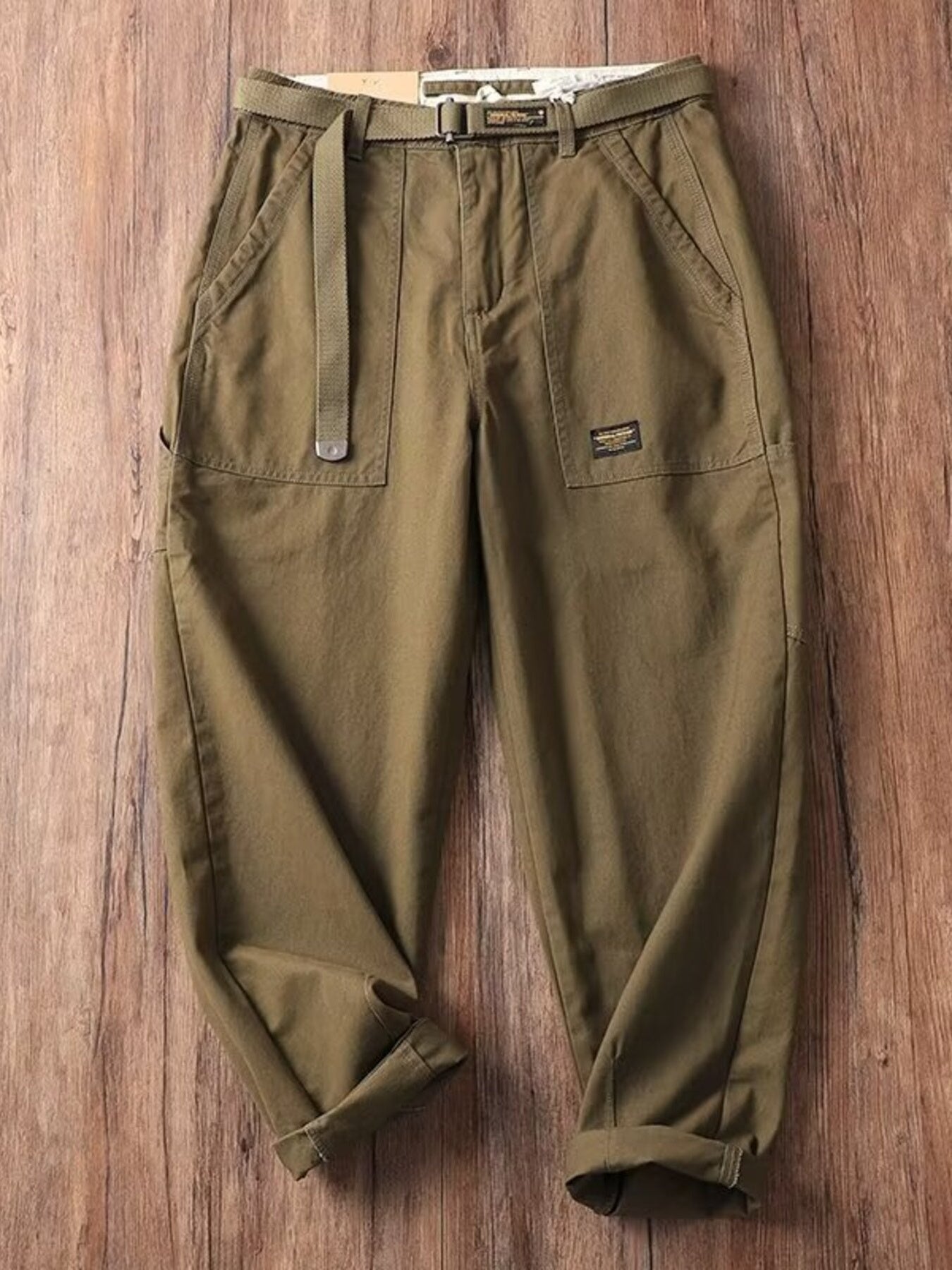 Men's olive green cargo sweatpants with belt and pocket details