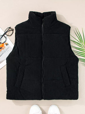 Black corduroy zip-up vest coat with stand-up collar and pockets.