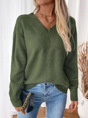 Army green acrylic v-neck sweater with a twisted back detail.