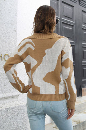 Women's camel and white abstract print polo knit sweater with collared neckline.